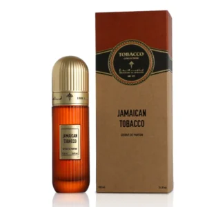 Ibraheem Al Qurashi Jamaican Tobacco Extrait De Parfum 100ml bottle on a tropical wooden surface with tobacco leaves and amber accents