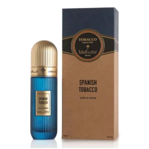 Ibraheem Al Qurashi Spanish Tobacco Extrait De Parfum 100ml bottle on a warm wooden surface with tobacco leaves