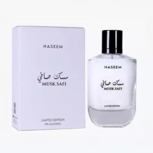 Naseem Musk Safi Attar 12ml concentrated perfume oil bottle on a soft white surface with lily of the valley flowers and vanilla beans